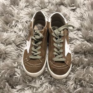 Brown sneakers with gold star